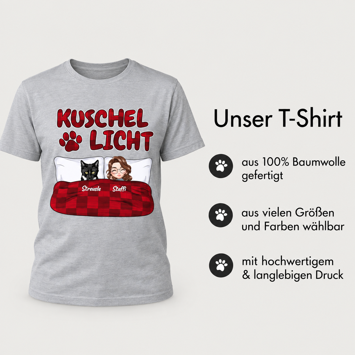 T-shirt gris chiné avec imprimé coloré de deux personnes et d'un animal noir sous une couverture.