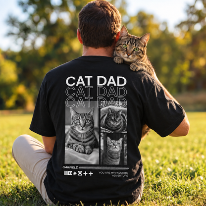 T-shirt noir avec l'inscription "Cat Dad" et motifs de chats, porté par une personne avec un chat.