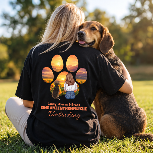 T-shirt noir avec illustration d'une femme et d'un chien entourés de tournesols et le texte "Eine unzertrennliche Verbindung".