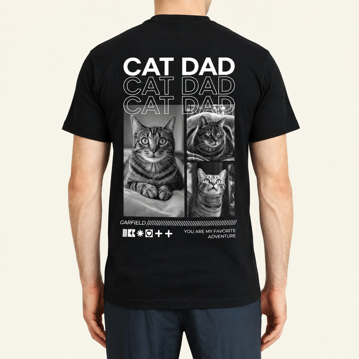 T-shirt noir avec l'inscription "Cat Dad" et des photos de chats au dos.