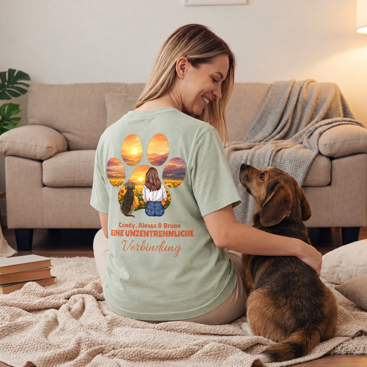 T-shirt vert au design personnalisé, grand motif de patte et une femme avec chien dans un champ de tournesols.