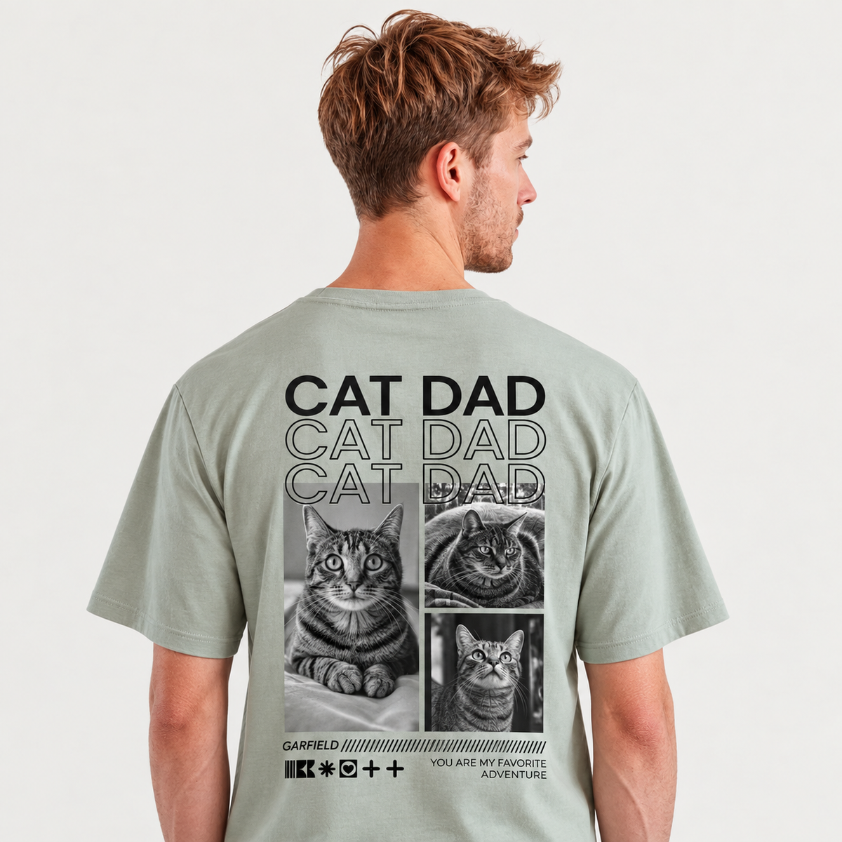 T-shirt vert olive personnalisé avec motifs de chats et inscription "CAT DAD" au dos.
