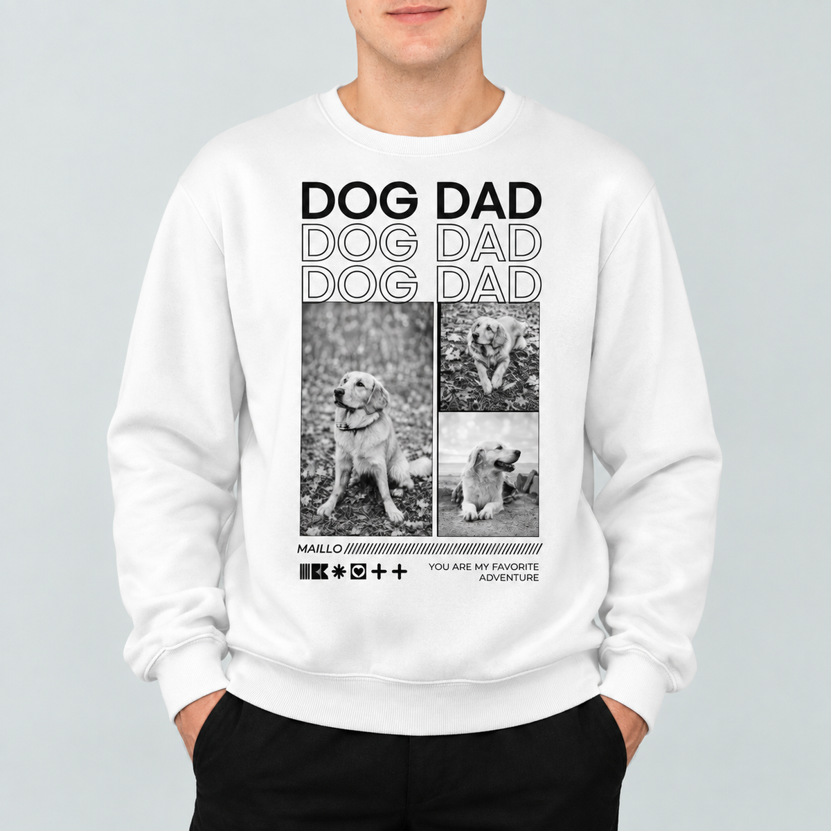 Witte sweater met de tekst "DOG DAD" en drie zwart-witfoto's van een hond.