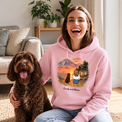 Sweat à capuche rose personnalisé avec illustration d'une personne et d'un chien dans la nature.