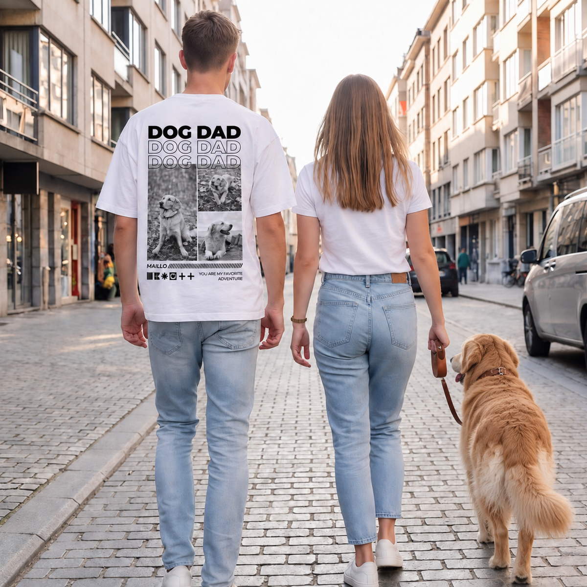 Des personnes promènent un chien dans la rue, l'une porte un T-shirt blanc avec le motif "DOG DAD".