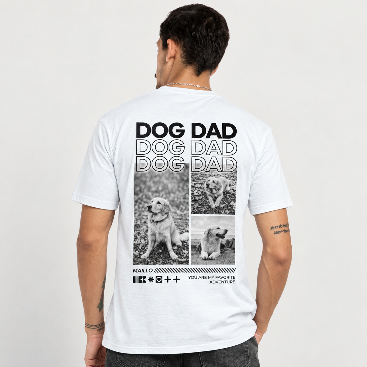 T-shirt blanc avec l'inscription "DOG DAD" et trois photos de chiens au dos.