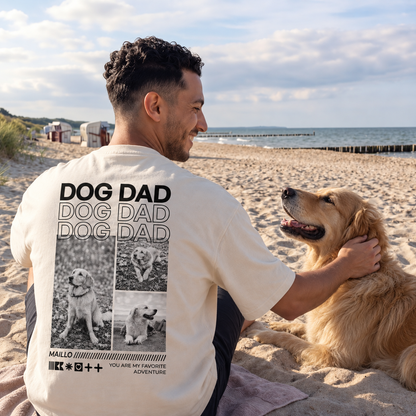 T-shirt beige avec l'inscription "DOG DAD", porté par un homme sur la plage avec un golden retriever.