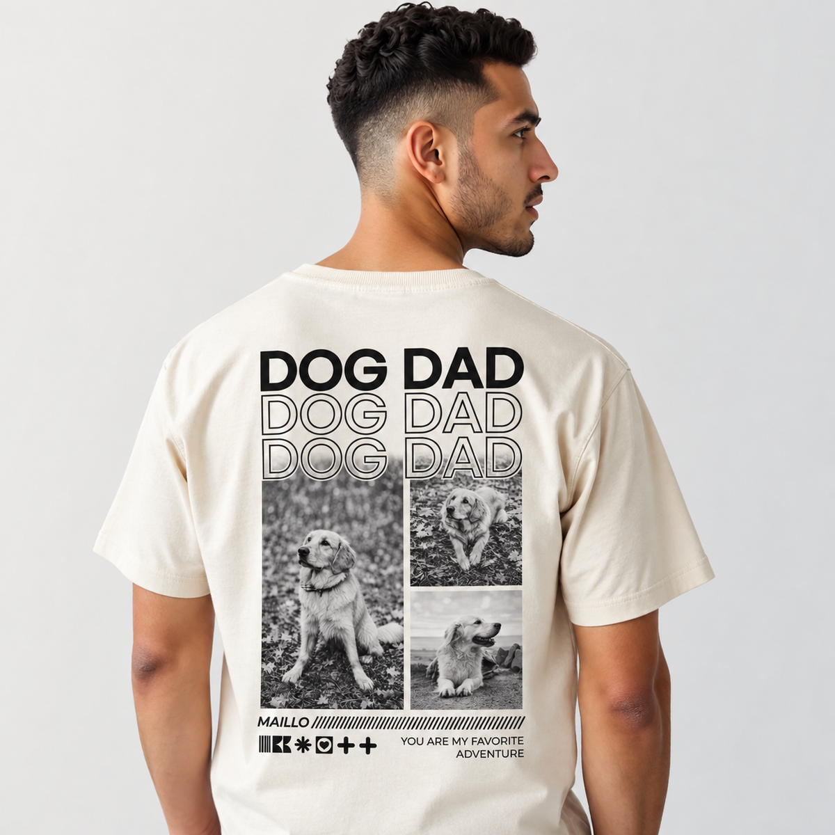 T-shirt beige avec graphique "DOG DAD" et photos noires de chiens au dos.