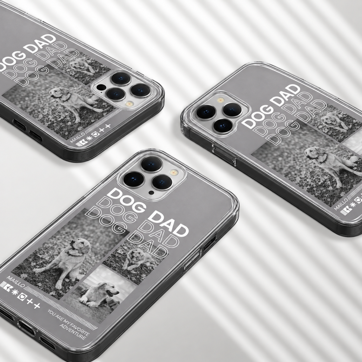 Gepersonaliseerd telefoonhoesje met hondenmotieven en de tekst "DOG DAD" in zwart-wit.