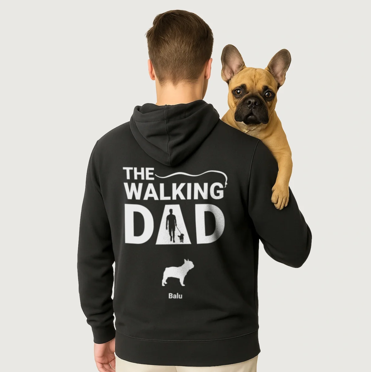 Zwarte hoodie met opdruk "THE WALKING DAD" en een hondenmotief op de rug.